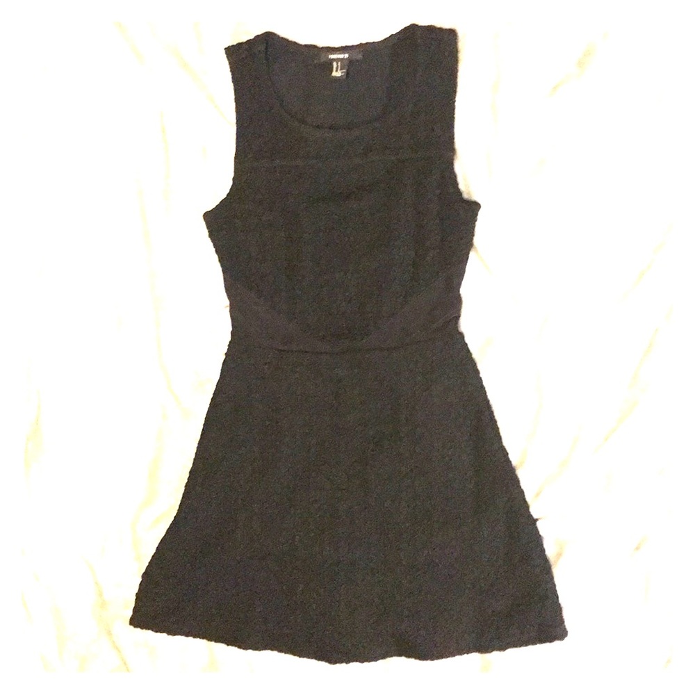 Black sleeveless mini dress w/ waist mesh cut out